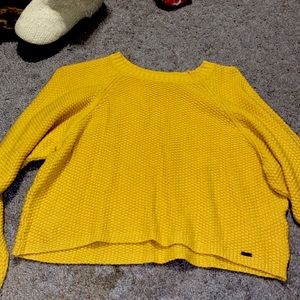 This is a yellow sweater from Hollister, size small, worn twice
